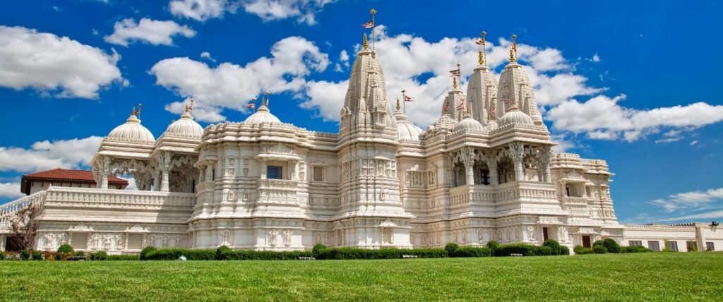 BAPS Hindu Mandir Abu Dhabi with traditional sandstone architecture and serene surroundings