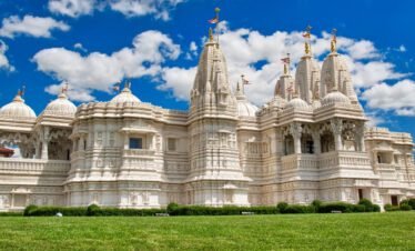 BAPS Hindu Mandir Abu Dhabi with traditional sandstone architecture and serene surroundings