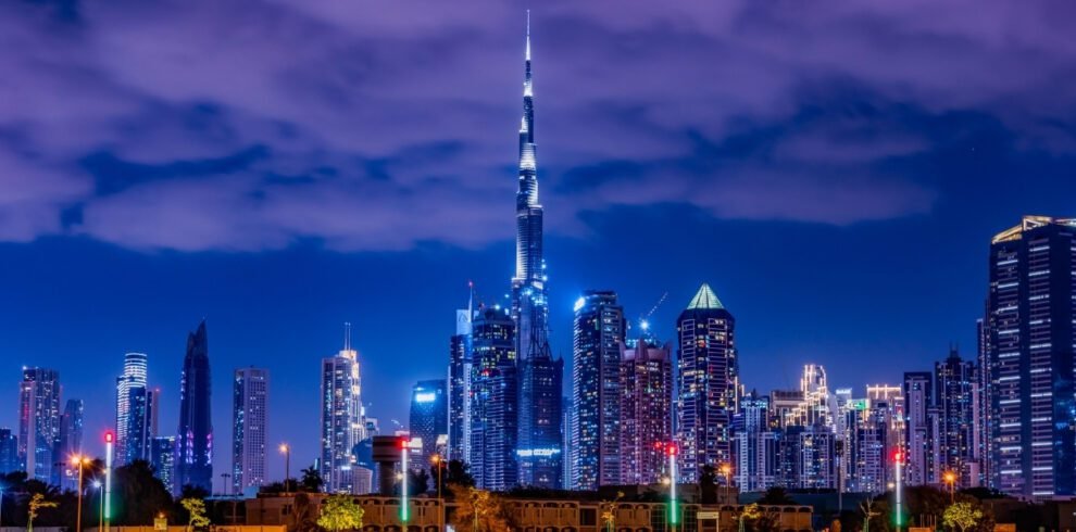 Burj Khalifa and Dubai skyline illuminated at night